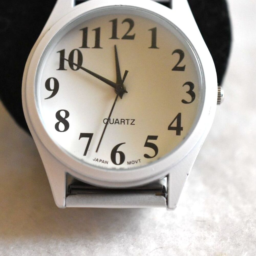 Contemporary White Metal 6" Stretch Band White Face New Battery Unisex Watch